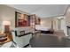Comfortable suite featuring a sleeper sofa, desk, and kitchenette with modern finishes at 125 E Harmon Ave # 511, Las Vegas, NV 89109