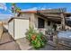Backyard with lush plants, BBQ grill and outdoor kitchen at 1251 Los Meadows Dr, Las Vegas, NV 89110