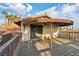 Balcony offering an outdoor space, with a view of the surrounding landscape. A covered area provides shade at 1251 Los Meadows Dr, Las Vegas, NV 89110