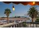 Balcony view overlooking the city skyline and palm trees at 1251 Los Meadows Dr, Las Vegas, NV 89110