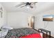 Bright bedroom with wood floors, ceiling fan and TV at 1251 Los Meadows Dr, Las Vegas, NV 89110