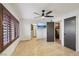 Bedroom featuring a TV and tile flooring at 1251 Los Meadows Dr, Las Vegas, NV 89110