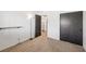 Neutral bedroom features carpet flooring and a built-in closet, perfect for storage at 1251 Los Meadows Dr, Las Vegas, NV 89110