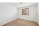 An empty bedroom featuring carpet flooring at 1251 Los Meadows Dr, Las Vegas, NV 89110