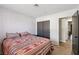 Bedroom features carpet flooring, closet, and access to the rest of the home at 1251 Los Meadows Dr, Las Vegas, NV 89110
