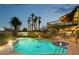 Backyard with a stunning pool, hot tub, and elevated deck, ideal for outdoor living at 1251 Los Meadows Dr, Las Vegas, NV 89110