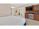 Cozy sleeping space with a kitchenette and easy access to a luxurious bathroom at 135 E Harmon Ave # 1403, Las Vegas, NV 89109