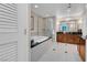 Bathroom featuring a soaking tub, walk-in shower with glass enclosure, and modern vanity with ample counter space at 135 E Harmon Ave # 1621, Las Vegas, NV 89109