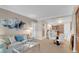 Relaxing living room featuring comfortable seating, neutral tones and easy access to the kitchen and dining area at 135 E Harmon Ave # 1621, Las Vegas, NV 89109