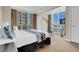 Bedroom features large windows with city views, a desk, and modern decor at 135 E Harmon Ave # 1621, Las Vegas, NV 89109