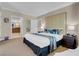 Bedroom features a king bed with nightstands and an ensuite bathroom at 135 E Harmon Ave # 1621, Las Vegas, NV 89109