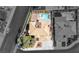 Aerial view showcasing a luxurious backyard pool and outdoor living space at 1502 Oxbow Ct, Henderson, NV 89014