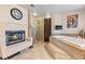 Bathroom featuring fireplace, soaking tub, walk-in shower and natural light at 1502 Oxbow Ct, Henderson, NV 89014