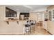 Kitchen offers stainless appliances, granite countertops, and a breakfast bar with seating at 1502 Oxbow Ct, Henderson, NV 89014