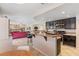 Open-concept kitchen flows into the living area, perfect for entertaining and modern living at 1502 Oxbow Ct, Henderson, NV 89014
