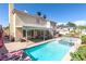 Enjoy outdoor living with a private pool, spa, covered patio, and an outdoor cooking area at 1502 Oxbow Ct, Henderson, NV 89014