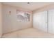 Bedroom featuring a large window at 1513 Brocado Ln, Las Vegas, NV 89117