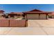 Charming home featuring a red tile roof, low maintenance landscaping, and an attached two-car garage at 1513 Brocado Ln, Las Vegas, NV 89117