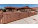 Charming home featuring a red tile roof, low maintenance landscaping, and an attached two-car garage at 1513 Brocado Ln, Las Vegas, NV 89117