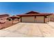 This charming home has a red tile roof, low maintenance front yard, and an attached two-car garage at 1513 Brocado Ln, Las Vegas, NV 89117