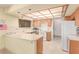 Traditional kitchen showcasing ample countertop space and white appliances at 1513 Brocado Ln, Las Vegas, NV 89117