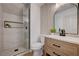 Stylish bathroom featuring a walk-in shower, modern vanity, and elegant fixtures at 1624 Ravanusa Dr, Henderson, NV 89052