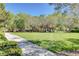 Scenic community park with walking paths, trees, and a gazebo at 1624 Ravanusa Dr, Henderson, NV 89052