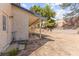 Backyard features a covered patio and access to the home at 165 Spinnaker Dr, Henderson, NV 89015