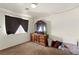 Bedroom with neutral carpet features a traditional wood dresser at 165 Spinnaker Dr, Henderson, NV 89015