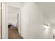 Hallway with carpet leads to bedrooms at 165 Spinnaker Dr, Henderson, NV 89015
