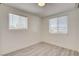 Bright, airy bedroom with wood-look floors, dual windows and a ceiling light fixture at 1708 Cedar Ave, Las Vegas, NV 89101