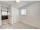 Clean bedroom with vinyl floors, features a closet and an open doorway with kitchen access at 1708 Cedar Ave, Las Vegas, NV 89101