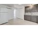 Clean, minimalist kitchen featuring sleek cabinetry, stainless steel sink, and modern refrigerator at 1708 Cedar Ave, Las Vegas, NV 89101