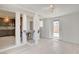 Open living area features light wood-look floors and access to an outdoor area at 1708 Cedar Ave, Las Vegas, NV 89101