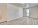 Bright living room with wood-look floors and access to a back patio with sliding glass door at 1708 Cedar Ave, Las Vegas, NV 89101