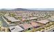 Sprawling aerial shot of a neighborhood featuring single-Gathering homes with tile roofs and manicured lawns at 172 Lunga Ave, Henderson, NV 89011