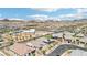 Panoramic aerial view of a residential community with desert landscapes and mountain backdrop at 172 Lunga Ave, Henderson, NV 89011