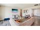 Inviting living room with wood floors, modern furniture, and a television at 172 Lunga Ave, Henderson, NV 89011