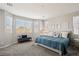 Spacious main bedroom with large windows, plush carpet, and ample natural light at 172 Lunga Ave, Henderson, NV 89011