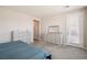 Neutral main bedroom with carpet, dressers, and access to outdoor living at 172 Lunga Ave, Henderson, NV 89011