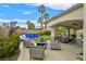 Spacious backyard features a covered patio and a refreshing above ground pool for relaxation and entertainment at 1780 Crystal Stream Ave, Henderson, NV 89012