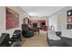 Versatile living space featuring an office area and a cozy seating area at 1780 Crystal Stream Ave, Henderson, NV 89012