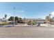 Inviting single-story home featuring gated entry, desert landscaping and solar panels at 1912 Parkchester Dr, Las Vegas, NV 89108