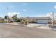 Charming single-story home with a well-maintained front yard and gated courtyard at 1912 Parkchester Dr, Las Vegas, NV 89108