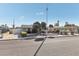 Charming single-story home with a well-maintained front yard and gated courtyard at 1912 Parkchester Dr, Las Vegas, NV 89108