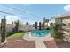 Backyard features refreshing in-ground pool, patio, desert landscaping and privacy at 1912 Parkchester Dr, Las Vegas, NV 89108