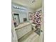 Bathroom featuring a single sink vanity, toilet, and shower/tub combination with geometric shower curtain at 2016 Mesquite Ln # 302, Laughlin, NV 89029