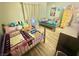 Shared bedroom featuring two twin beds, a chest of drawers, and soft lighting at 2016 Mesquite Ln # 302, Laughlin, NV 89029