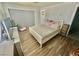 Cozy bedroom with a queen-sized bed, side table, and ample natural light at 2016 Mesquite Ln # 302, Laughlin, NV 89029