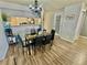 Stylish dining room features a modern table with seating for six and a decorative chandelier at 2016 Mesquite Ln # 302, Laughlin, NV 89029